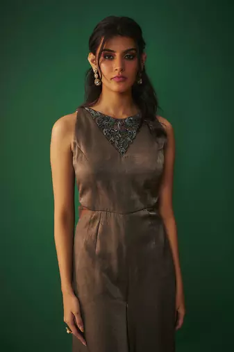 Grey flared jumpsuit with embroidered neck