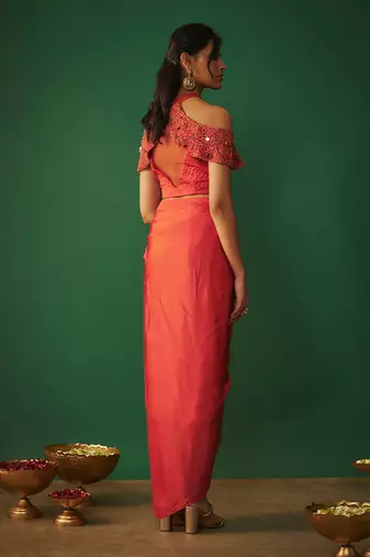 Orange embroidered top and draped skirt set