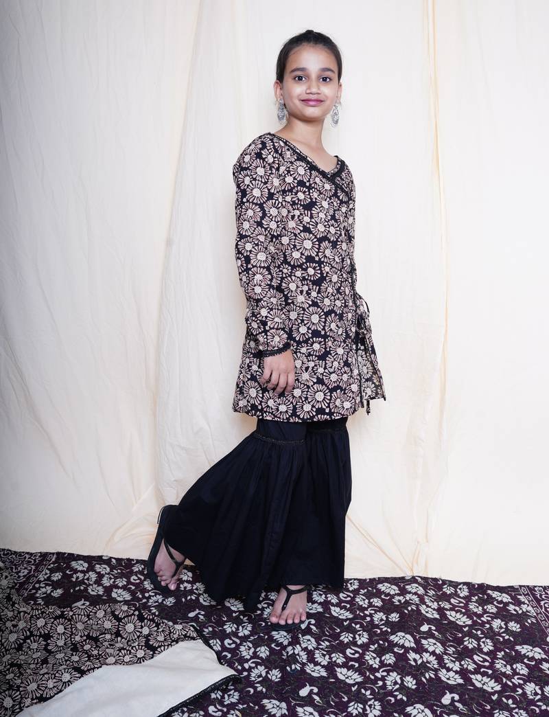 Black bagru handblock printed full sleeves angrakha kurta embellished with crochet lace , paired with black sharara