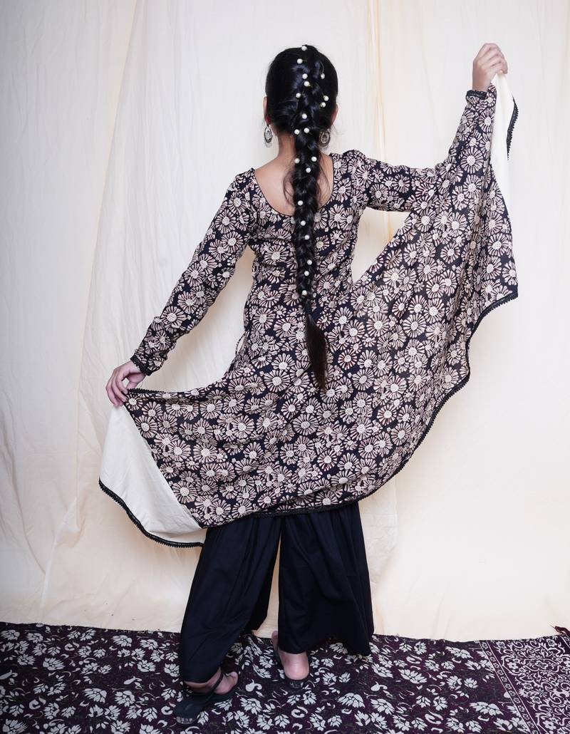 Black bagru handblock printed full sleeves angrakha kurta embellished with crochet lace , paired with black sharara