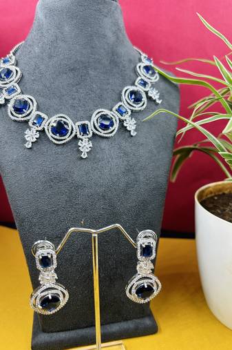 Purple stone american diamond set