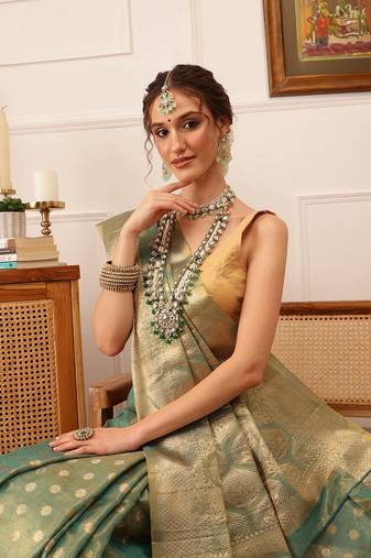 Teal Floral Zari Woven Tissue Saree