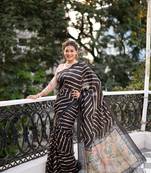 Tussar Silk Blend Saree With Beautiful Leriya Print And Zari Border With Kalamkari Pallu And Tassels