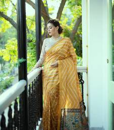 Tussar Silk Saree With Beautiful Leriya Print And Zari Border With Kalamkari Pallu And Tassels
