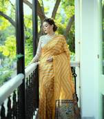 Tussar Silk Saree With Beautiful Leriya Print And Zari Border With Kalamkari Pallu And Tassels