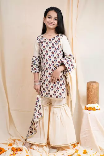 bagru handblock printed quarter frill sleeves short kurta, paired with beige sharara