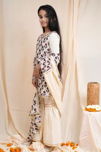 bagru handblock printed quarter frill sleeves short kurta, paired with beige sharara
