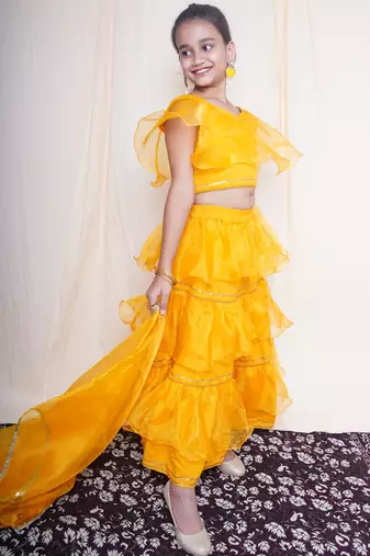 A mellow yellow lehnga set for baby girls