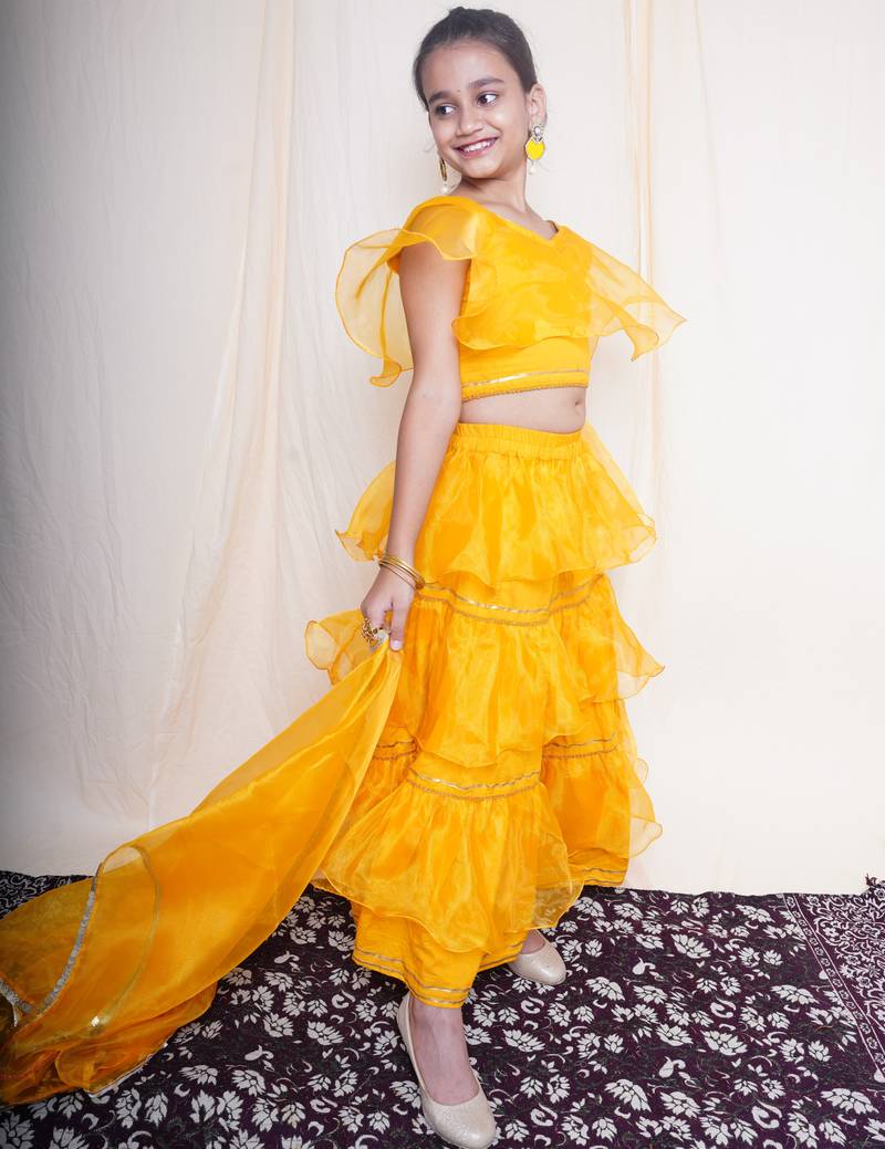 A mellow yellow lehnga set for baby girls