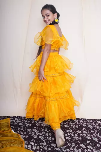 A mellow yellow lehnga set for baby girls