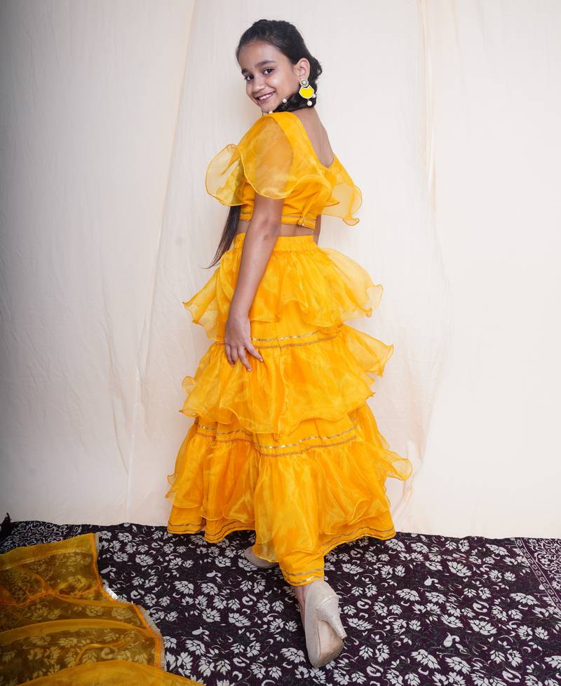 A mellow yellow lehnga set for baby girls