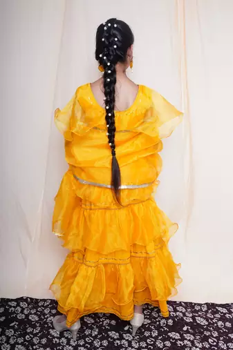 A mellow yellow lehnga set for baby girls