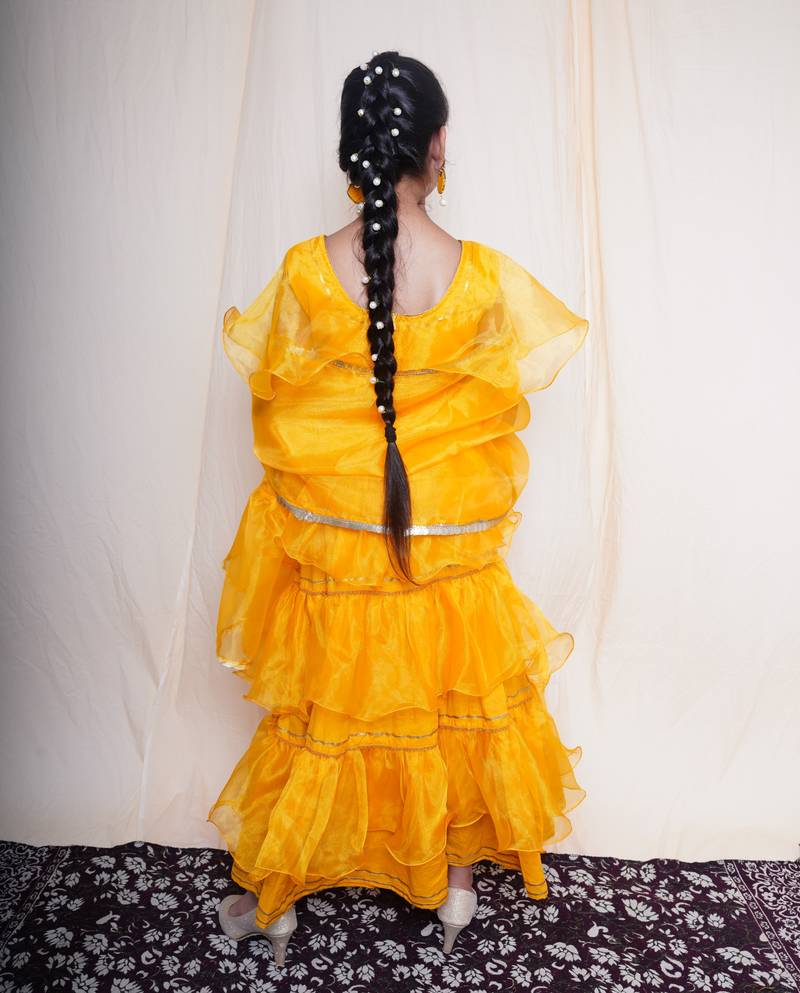 A mellow yellow lehnga set for baby girls