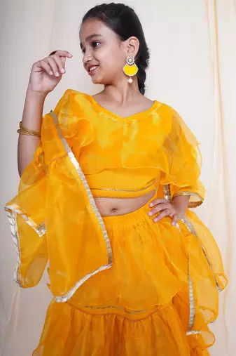A mellow yellow lehnga set for baby girls