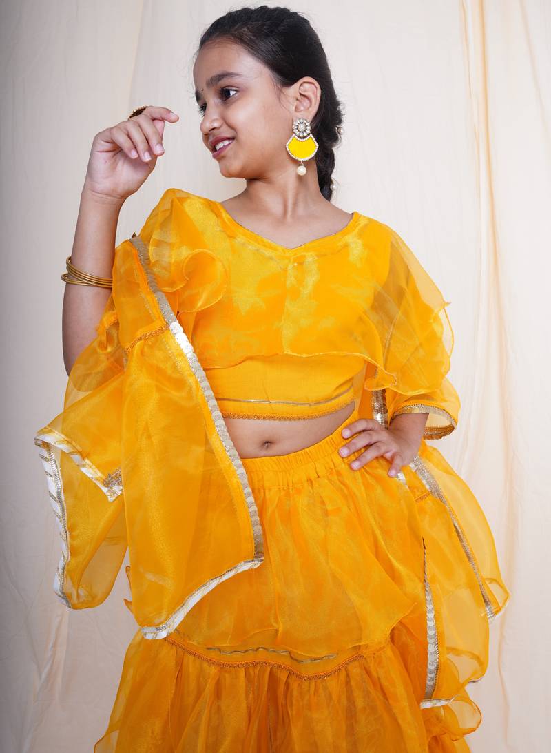 A mellow yellow lehnga set for baby girls