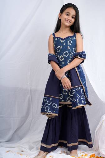 Indigo handblock printed sleeveless short kurta, paired with indigo sharara