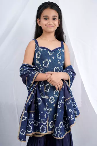 Indigo handblock printed sleeveless short kurta, paired with indigo sharara