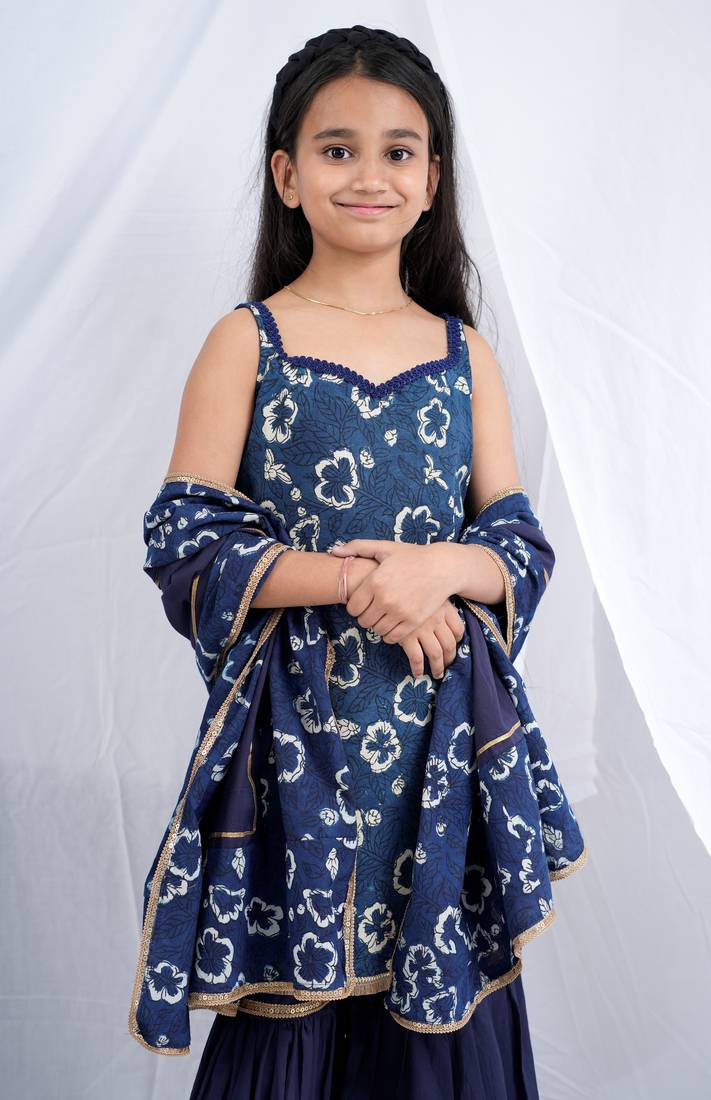 Indigo handblock printed sleeveless short kurta, paired with indigo sharara