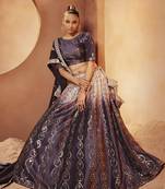 Dark violet colour velvet embroidered designer lehenga for wedding