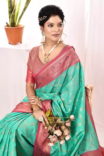 Elora soft silk banarasi woven chex weaving saree (sea green)
