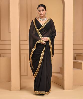Black lace embellished georgette saree with blouse 2