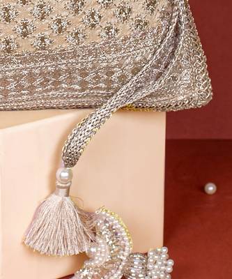 Gold inaya gold potli bag 2