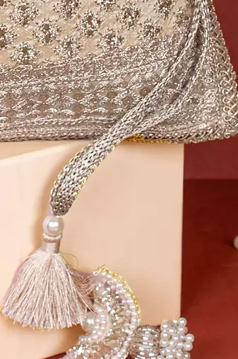 Gold inaya gold potli bag
