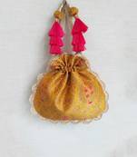 Mustard kashi yellow banarasi silk potli bag