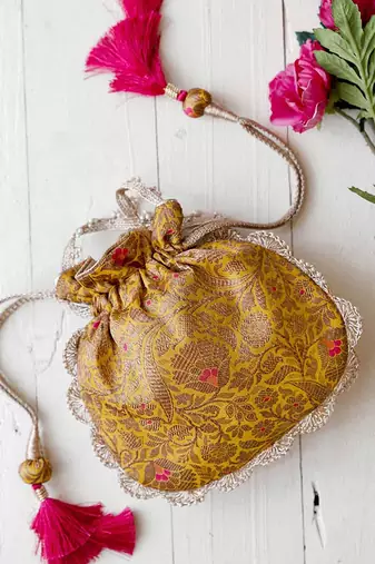 Mustard kashi yellow banarasi silk potli bag