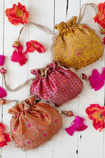 Mustard kashi yellow banarasi silk potli bag