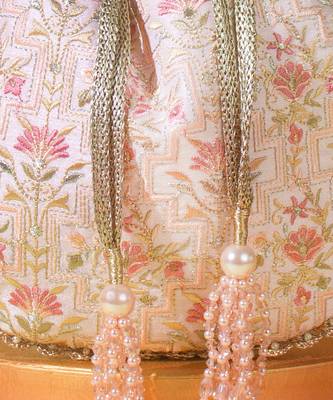 Baby pink mogra scallop potli bag 3