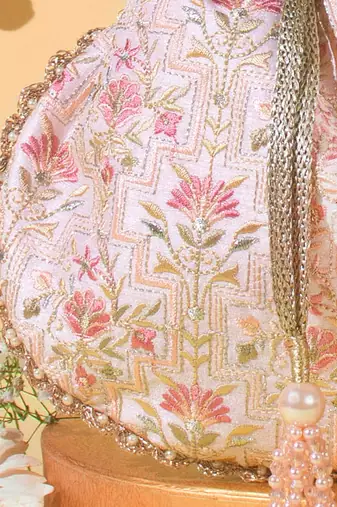 Baby pink mogra scallop potli bag