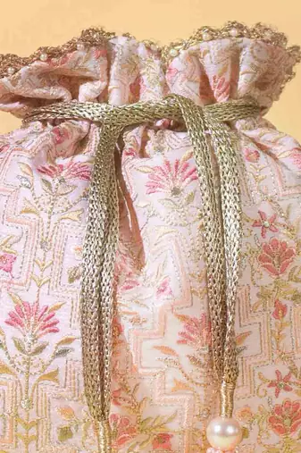 Baby pink mogra scallop potli bag