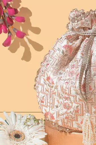 Off white mogra scallop potli bag