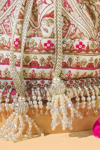 Off white rumi potli bag