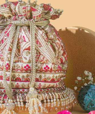Off white rumi potli bag 3