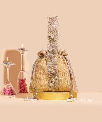 Light orange tara potli bag 1