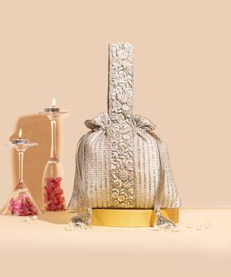 Champagne tara potli bag 1