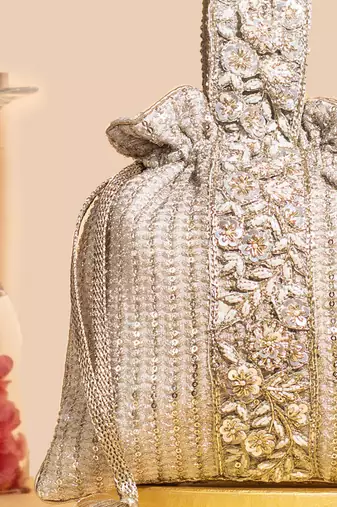 Champagne tara potli bag