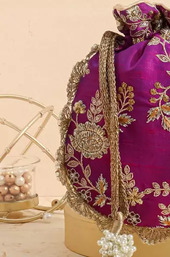 Purple purple embroidered scallop potli bag