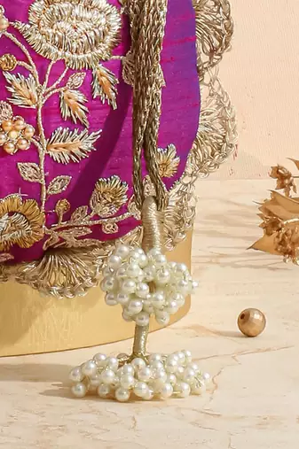 Purple purple embroidered scallop potli bag