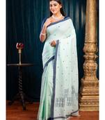 Sea green pure handloom cotton saree with blue polka dots and border