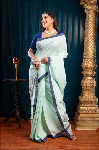 Sea green  handloom cotton saree with blue polka dots and border