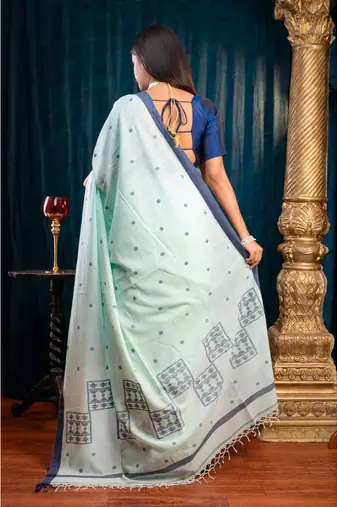 Sea green  handloom cotton saree with blue polka dots and border