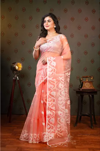 Coral  muslin saree offwhite woven motifs with running blouse piece