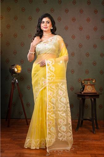 Light yellow pure muslin saree offwhite woven motifs with running blouse piece