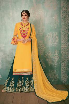 Yellow  embroidered georgette semi stitched straight palazzo suit. 1