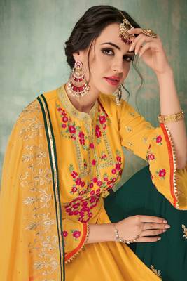 Yellow  embroidered georgette semi stitched straight palazzo suit. 2