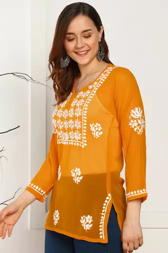 Women floral embroidered georgette orange kurti