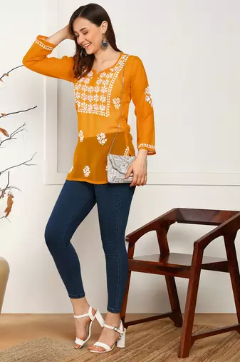 Women floral embroidered georgette orange kurti